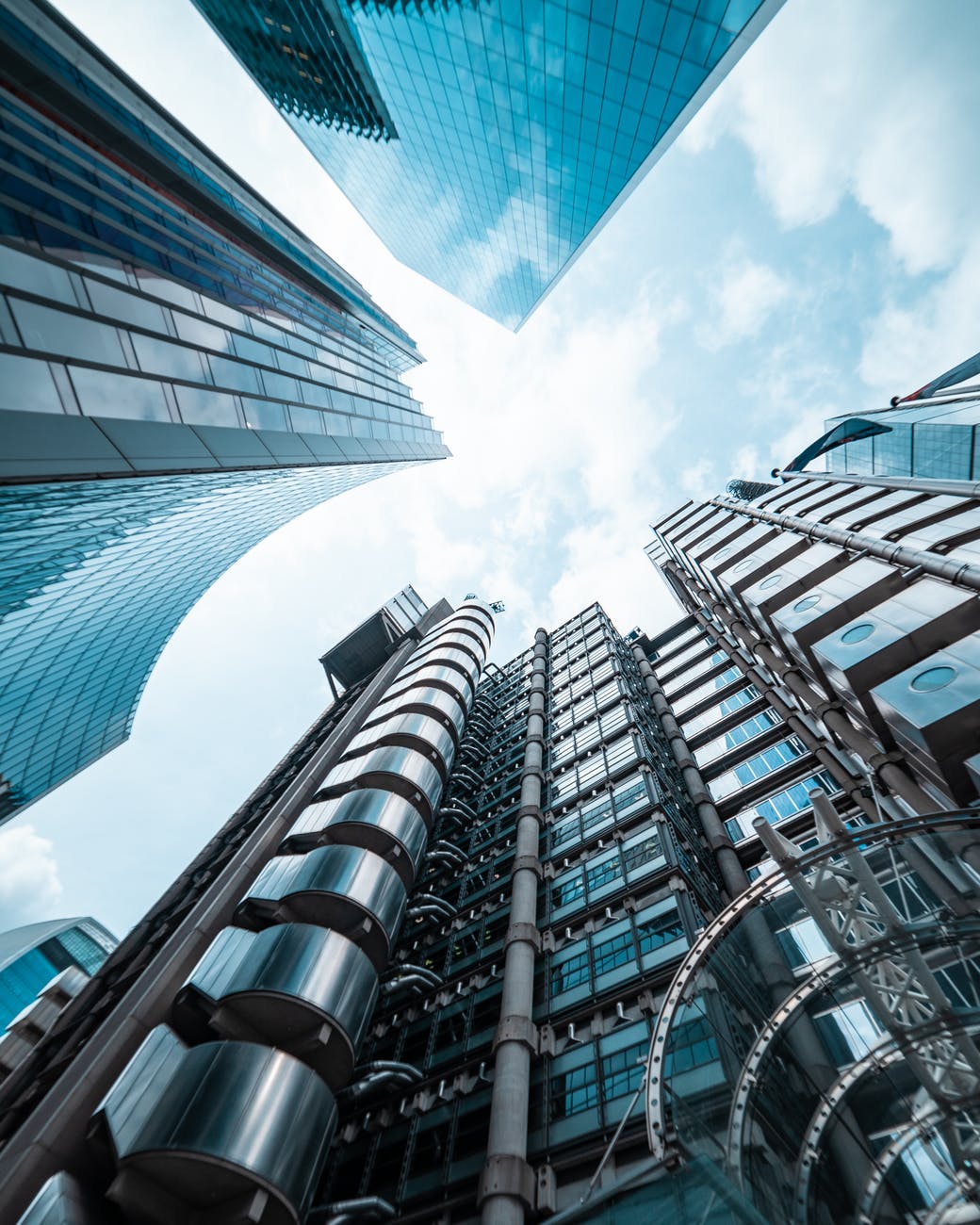 low angle photography of curtain wall high rise building