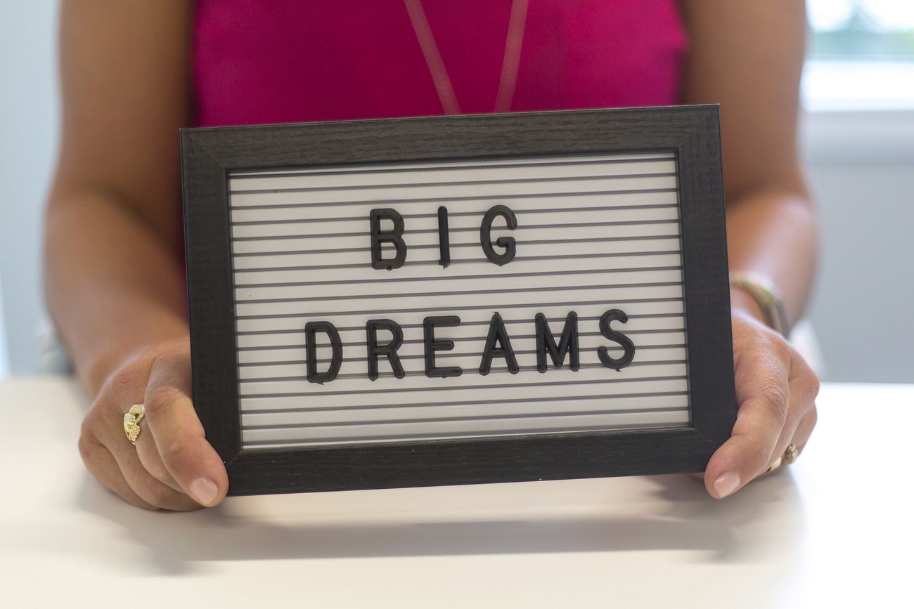 Free big dreams sign held