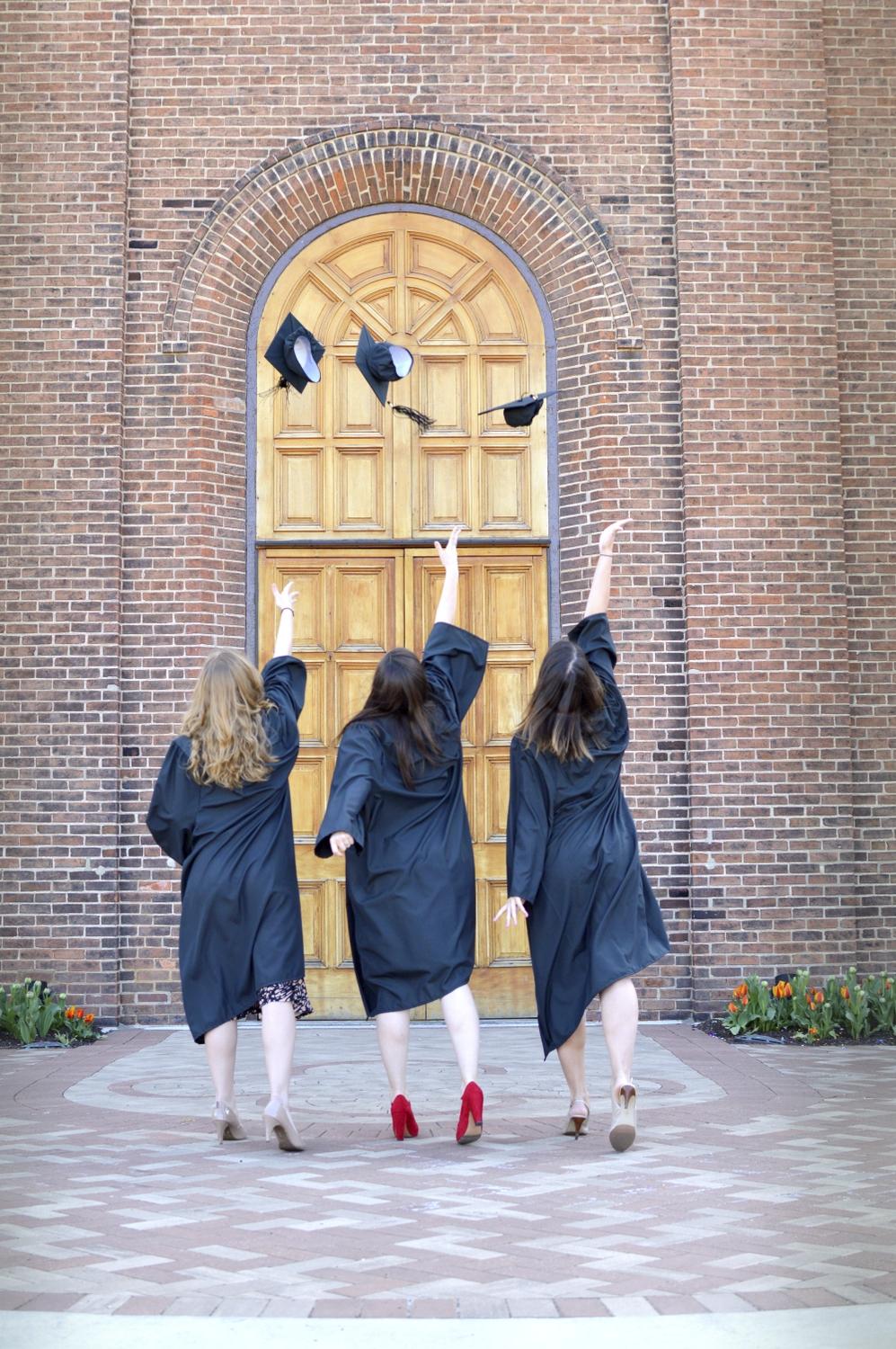 Graduation Girls throwing caps
